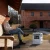 full-shot-smiley-man-using-laptop_2500_2500.webp